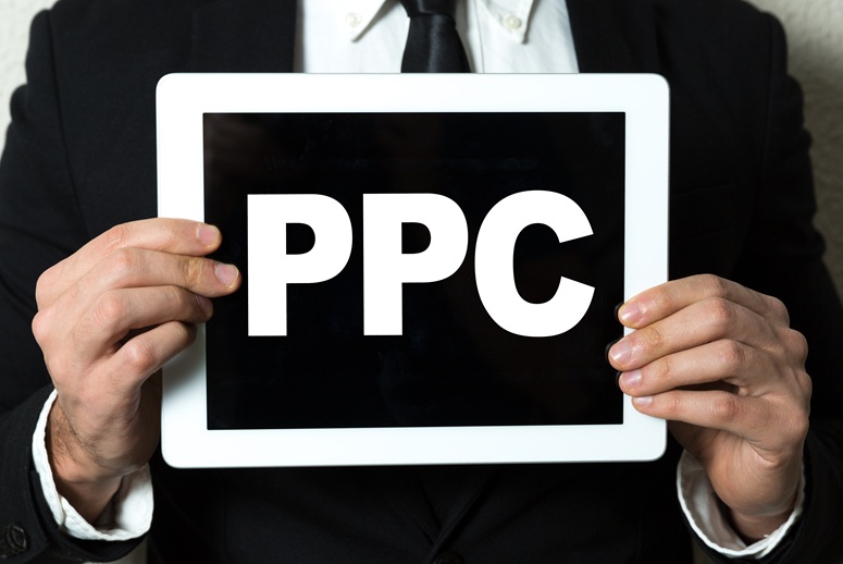 Person holding PPC sign